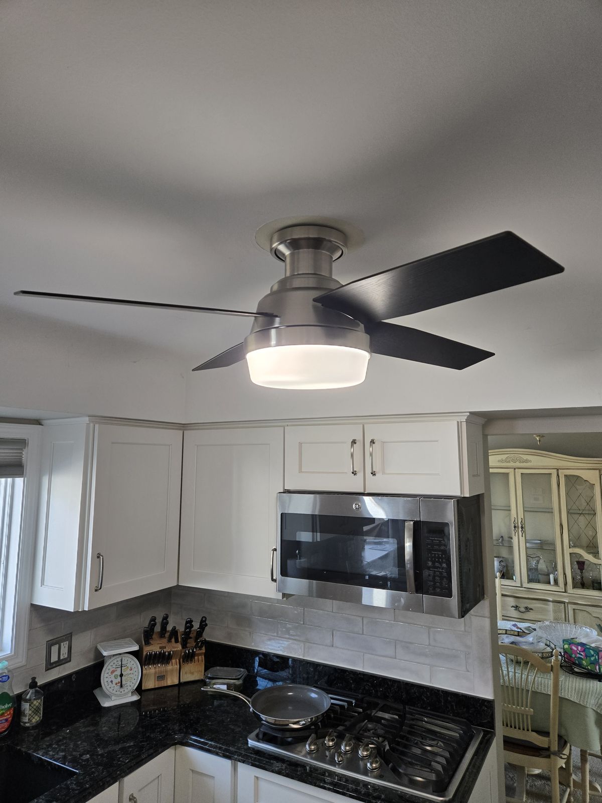 Ceiling fan with light in a kitchen