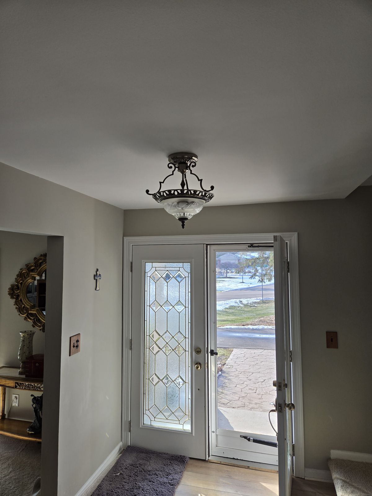 Semi-flush ceiling fixture in an entryway